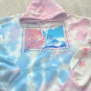 A graphic hoodie XL that’s 50%cotton have been worn